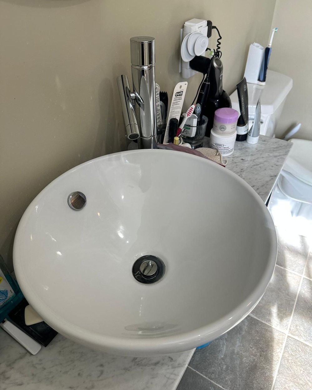 After: a clean vessel sink, spotless and streak-free